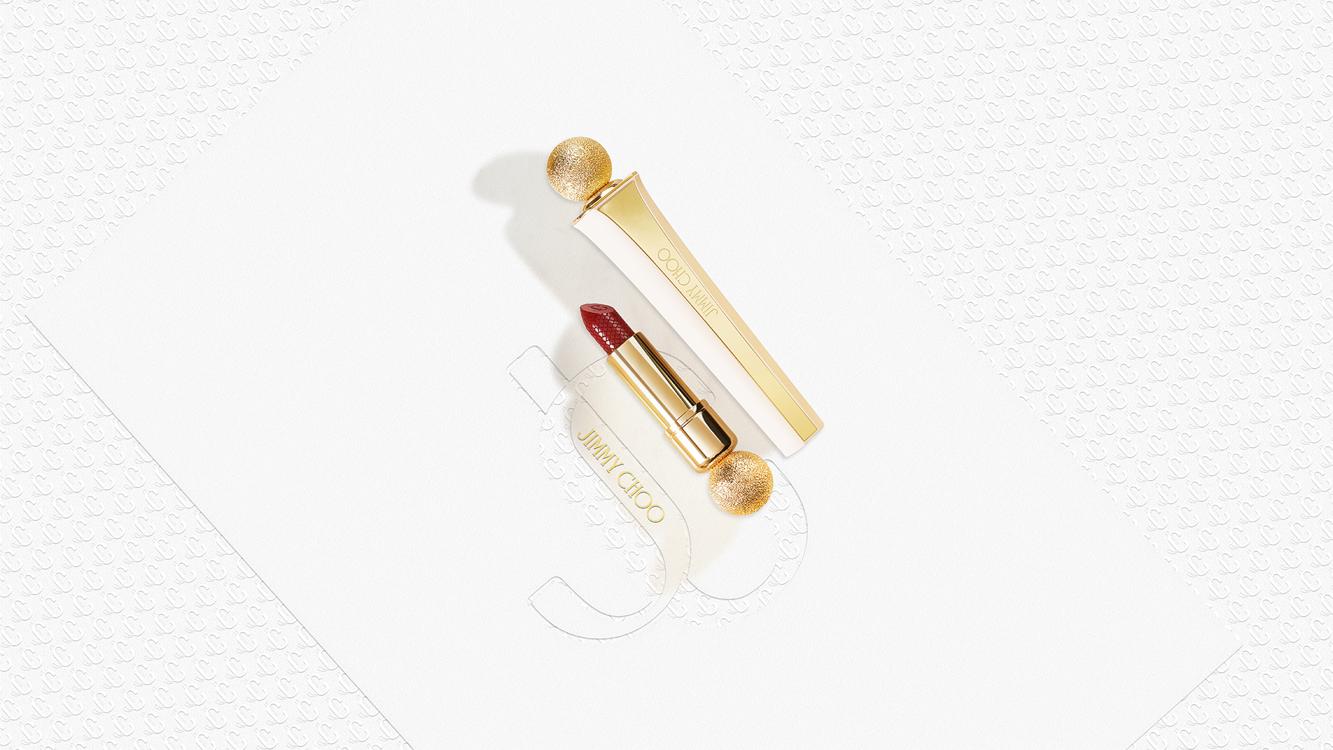 Mock-up of Jimmy Choo Lipstick from the seduction collection, red lipstick on branding paper